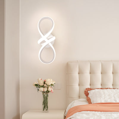 Applique murale LED en spirale créative contemporaine en fer et silicone pour chambre à coucher 