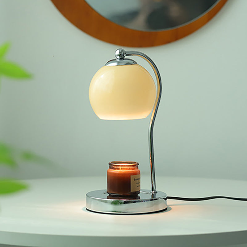 Modern Minimalist Orb Iron Glass 1-Light Melting Wax Table Lamp For Bedroom