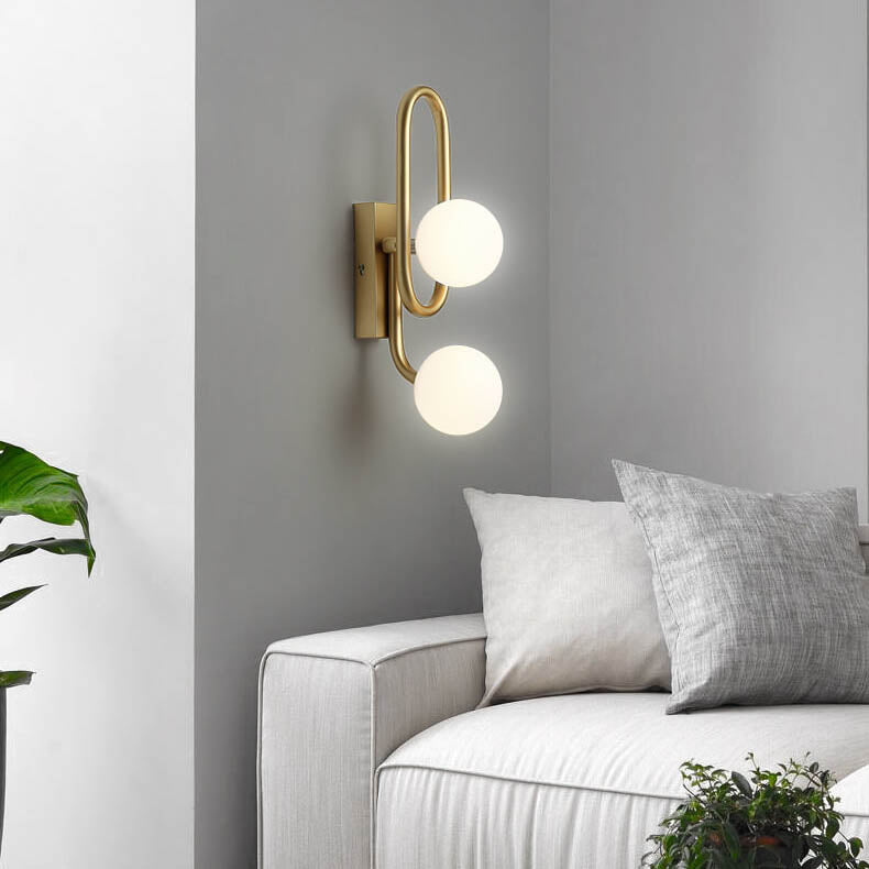 Lampe murale moderne de luxe simple en fer doré à 2 lumières avec haricots magiques 