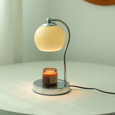 Modern Minimalist Orb Iron Glass 1-Light Melting Wax Table Lamp For Bedroom