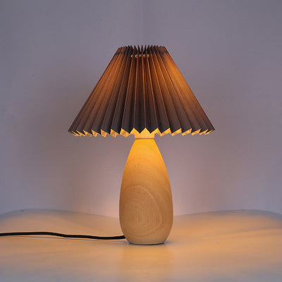 Zeitgenössische Retro Plissee Stoff Massivholz Basis 1-Licht Tischlampe für Schlafzimmer 