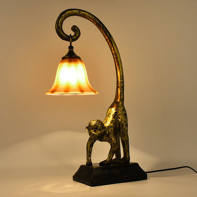 Lampe de table contemporaine et créative à 1 lumière en verre de cuivre et de singe pour chambre à coucher 