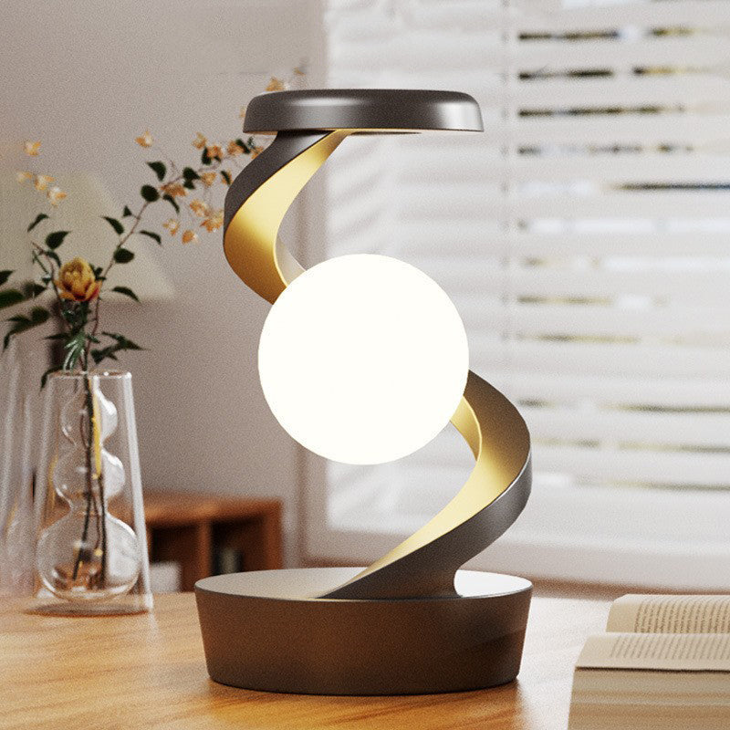 Contemporary Creative Orb Levitating Rotating ABS LED Table Lamp For Bedroom