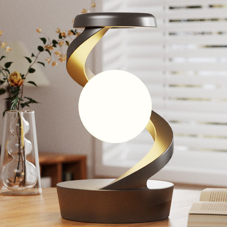 Contemporary Creative Orb Levitating Rotating ABS LED Table Lamp For Bedroom