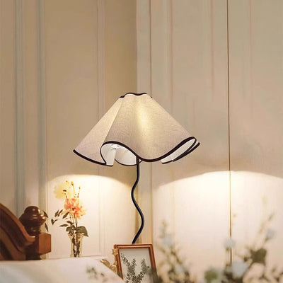 Contemporary Nordic Wave Iron Fabric Petal Flower 1-Light Table Lamp For Living Room