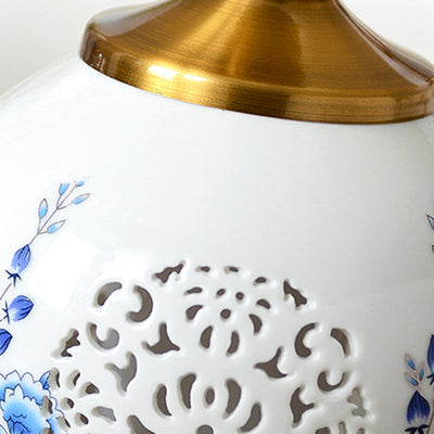 Traditional Chinese Round Table Ball Flower Hollowed Metal Ceramic Fabric 1-Light Table Lamp For Bedroom