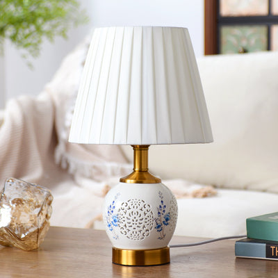 Traditional Chinese Round Table Ball Flower Hollowed Metal Ceramic Fabric 1-Light Table Lamp For Bedroom