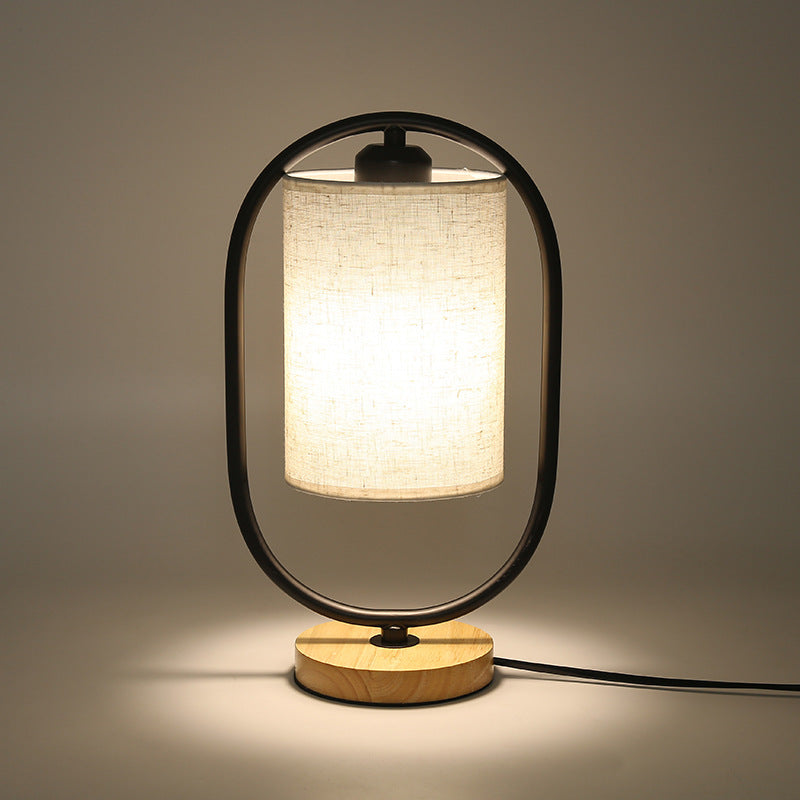 Contemporary Scandinavian Oval Cylinder Solid Wood Metal Fabric 1-Light Table Lamp For Bedroom