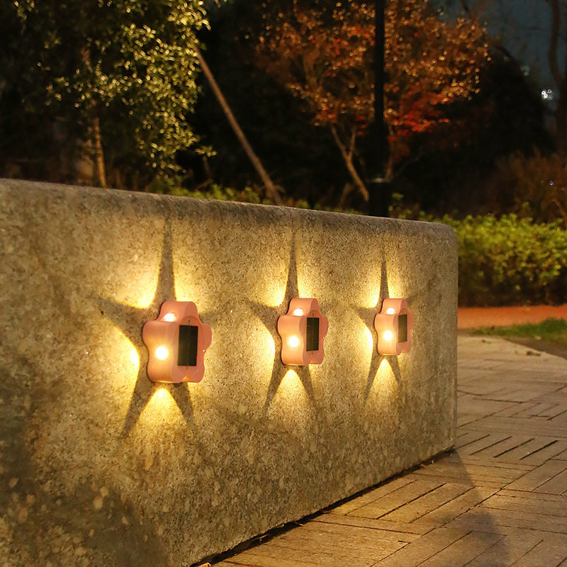 Contemporary Industrial ABS Plum Blossom LED Solar Outdoor Wall Sconce Lamp For Garden