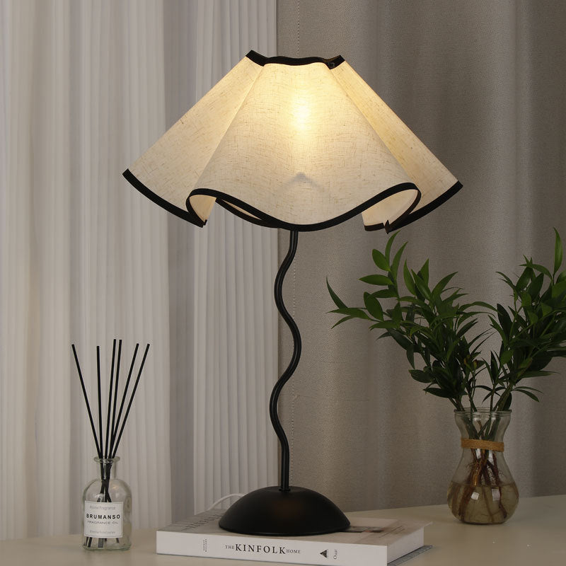 Contemporary Creative Fabric Petal Shade Curved Iron Base 1-Light Table Lamp For Bedroom