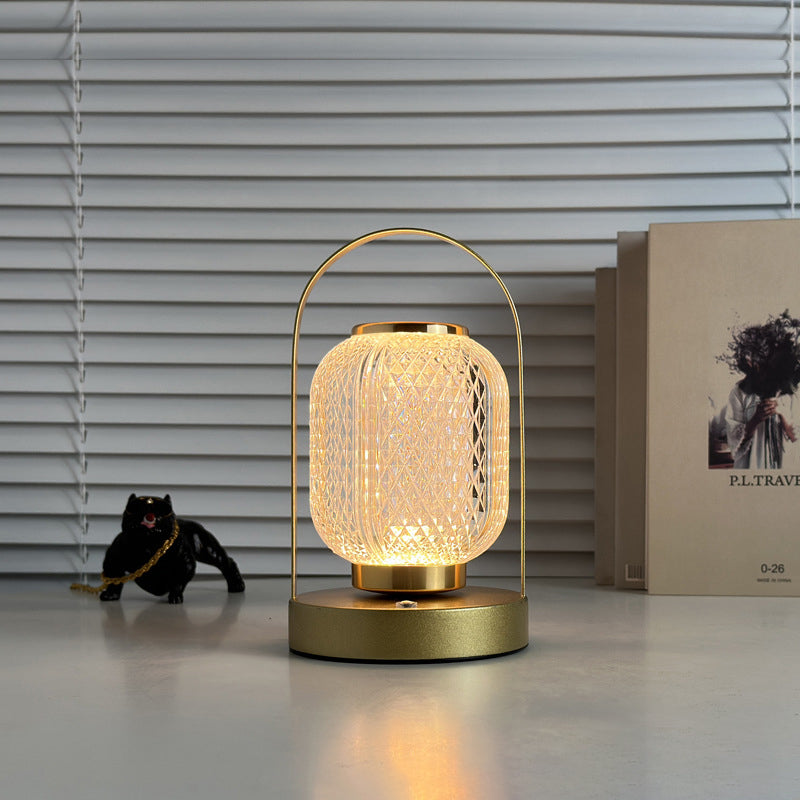 Moderne minimalistische Handheld zylindrische Eisen Acryl LED Tischlampe für Schlafzimmer 