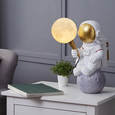 Contemporary Creative Kids Cartoon Astronaut Resin 1-Light Table Lamp For Bedroom