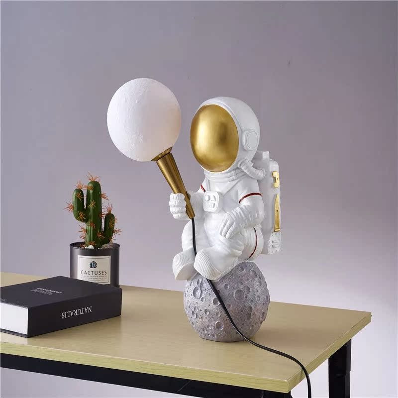 Contemporary Creative Kids Cartoon Astronaut Resin 1-Light Table Lamp For Bedroom