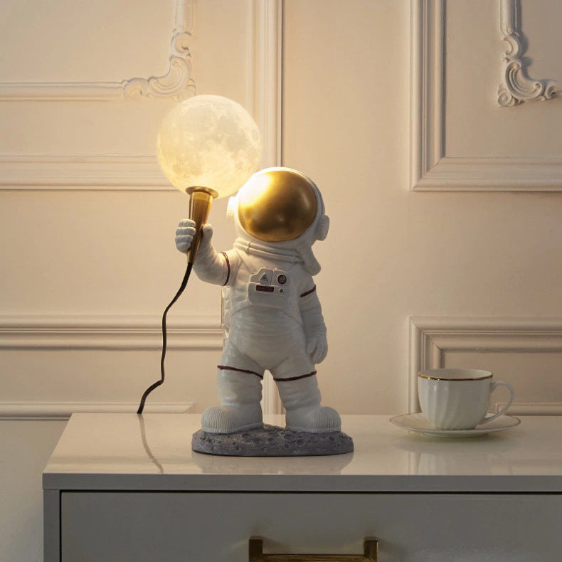 Contemporary Creative Kids Cartoon Astronaut Resin 1-Light Table Lamp For Bedroom