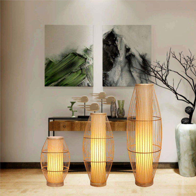 Traditional Japanese Wine Barrel Round Hollowed Out Parchment-Like Bamboo 1-Light Standing Floor Lamp For Living Room