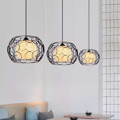 Modern Minimalist Round Hollowed Out Sesame Ball Iron 1-Light Pendant Light For Living Room