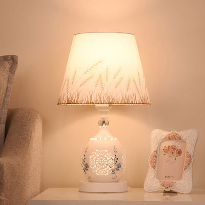 Contemporary Nordic Ceramic Fabric Cylinder Flower Skeleton Pattern 1-Light Table Lamp For Bedside