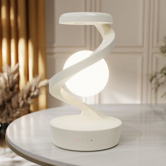 Contemporary Creative Rechargeable ABS Ball Rotating Suspension Wireless Charging LED Table Lamp Night Light For Bedside