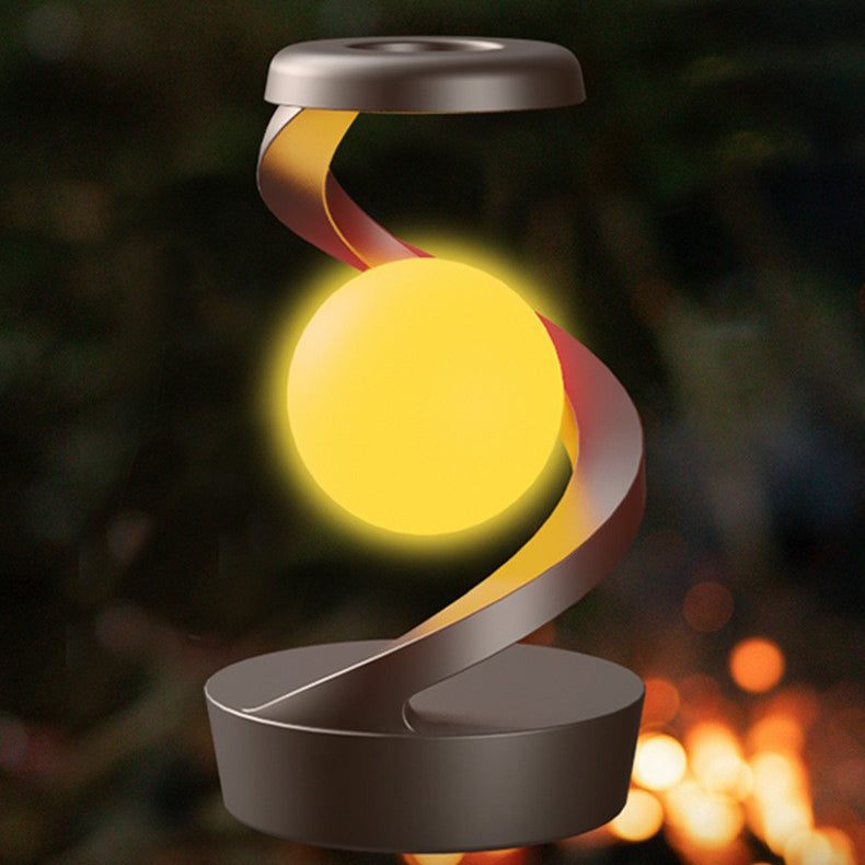 Contemporary Creative Rechargeable ABS Ball Rotating Suspension Wireless Charging LED Table Lamp Night Light For Bedside