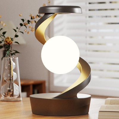 Contemporary Creative Rechargeable ABS Ball Rotating Suspension Wireless Charging LED Table Lamp Night Light For Bedside