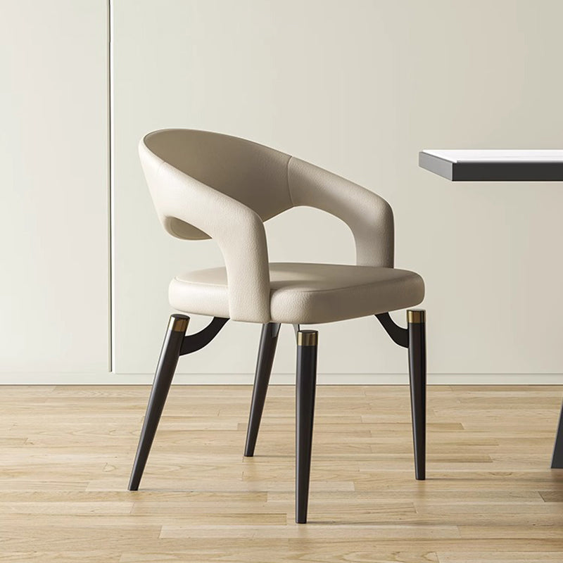 Chaise de salle à manger en cuir simplicité moderne en acier au carbone avec dossier et accoudoirs 