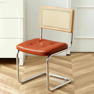 Contemporary Boho Rattan Leather Stainless Steel Dining Chair Backrest Armless For Dining Room