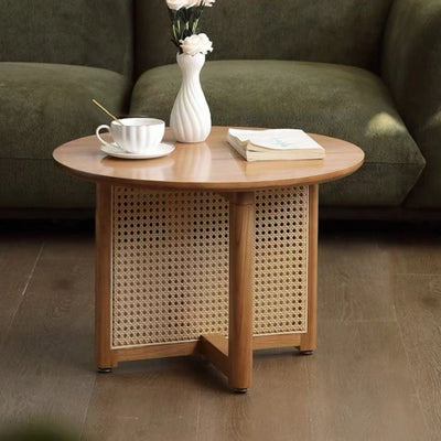 Table basse contemporaine ronde en bois avec tissage en rotin à pieds croisés pour salon 