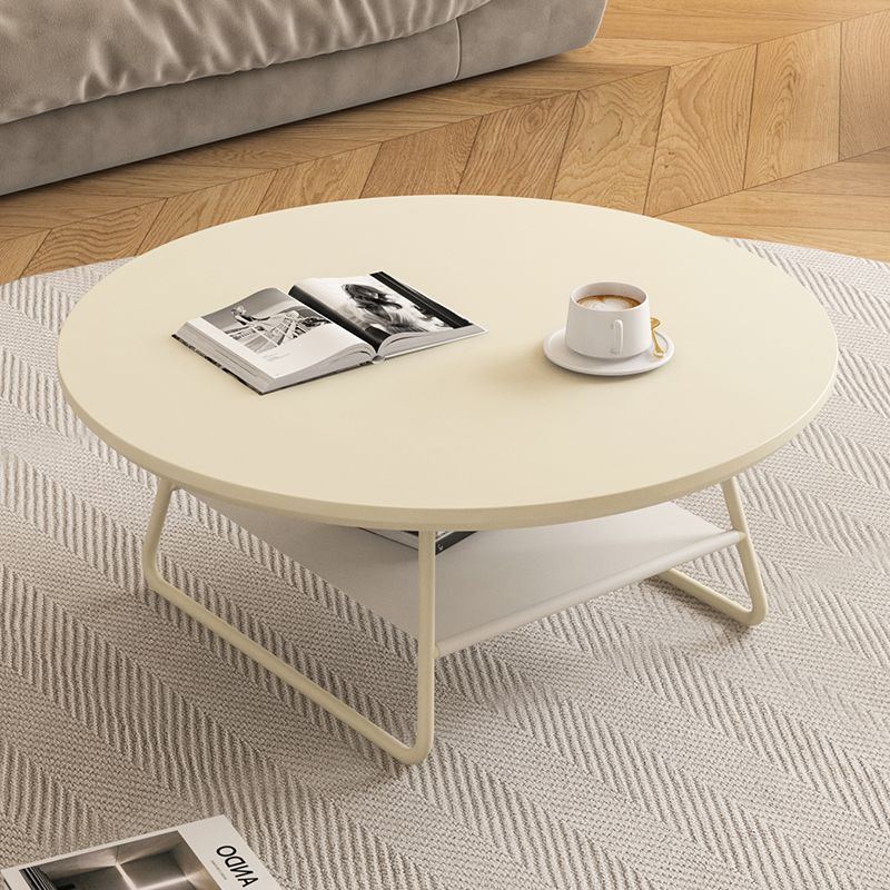 Table basse moderne minimaliste en fer rond crème à deux niveaux pour salon 