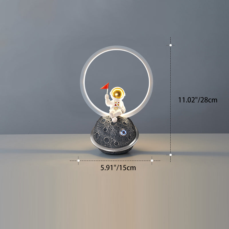 Contemporary Creative Resin Cartoon Astronaut Planet Iron Ring LED Kids Table Lamp For Bedroom