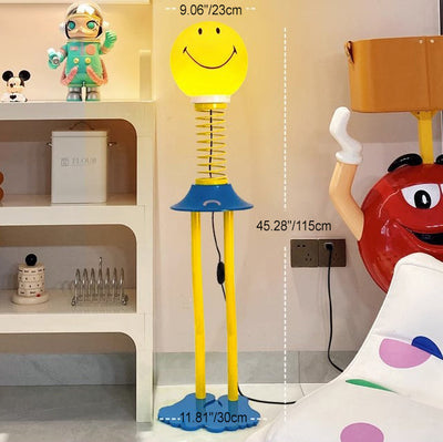 Contemporary Creative PVC Iron Smile Cartoon Character 1-Light Standing Floor Lamp For Living Room