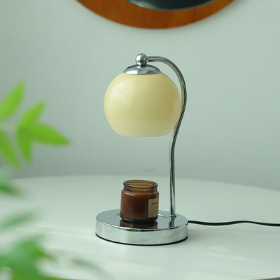 Modern Minimalist Orb Iron Glass 1-Light Melting Wax Table Lamp For Bedroom