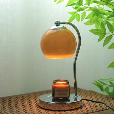 Modern Minimalist Orb Iron Glass 1-Light Melting Wax Table Lamp For Bedroom