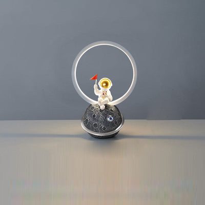 Contemporary Creative Resin Cartoon Astronaut Planet Iron Ring LED Kids Table Lamp For Bedroom